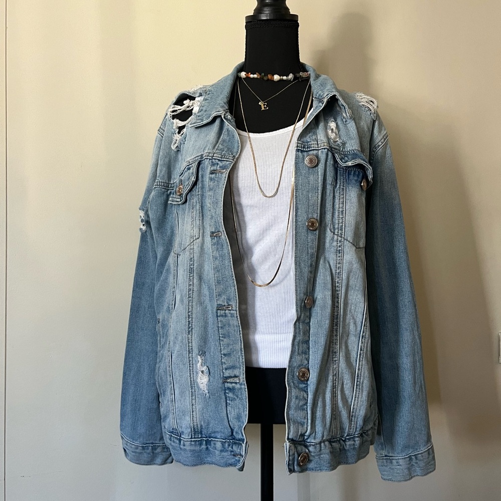 Distressed denim jacket.